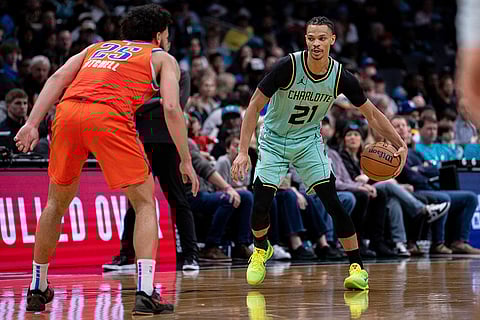 NBA: Thunder guard Ajay Mitchell guards Hornets guard Isaiah Wong