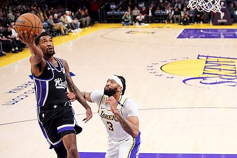 NBA: Kings guard Malik Monk shoots as Lakers forward Anthony Davis defends
