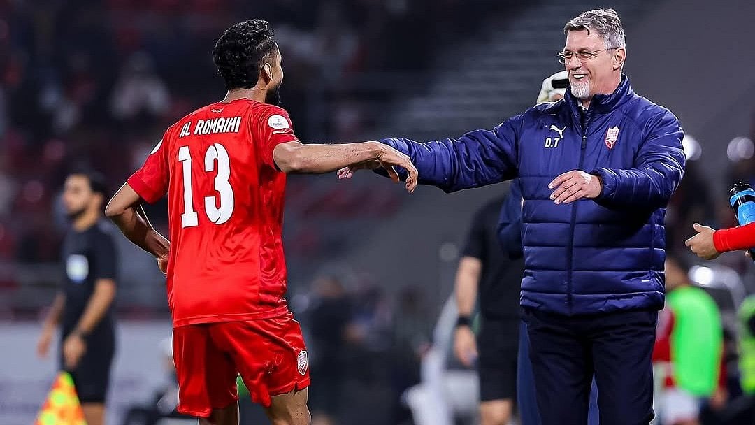 X/bahrainnt1 : Bahrain manager Dragan Talajic celebrates a goal with his player.