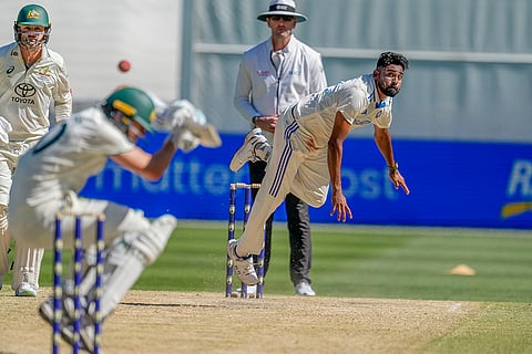 India Vs Australia, 4th Test Day 4: India's Mohammed Siraj, right, bowls a bouncer to Pat Cummins
