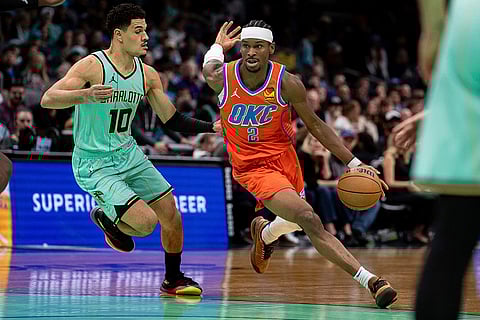 NBA: Hornets guard Josh Green (10) guards Thunder guard Shai Gilgeous-Alexander