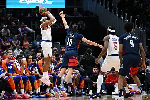NBA: Knicks guard Miles McBride attempts a 3-point basket