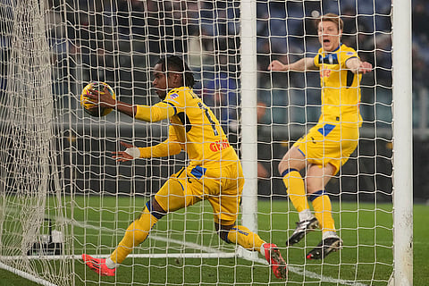 Atalanta's Ademola Lookman, left, celebrates after a goal