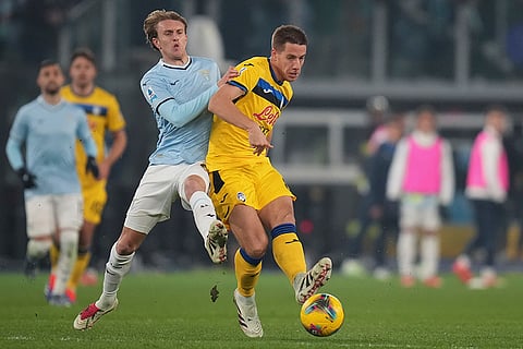 Serie A 2024-25: Lazio's Nicolo Rovella, left, duels for the ball with Atalanta's Mario Pasalic