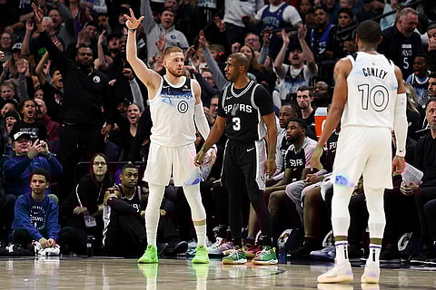 NBA 2024-25: Timberwolves guard Donte DiVincenzo celebrates his three-point basket