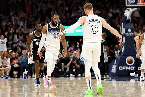 NBA 2024-25: Timberwolves guard Mike Conley celebrates his three-point basket