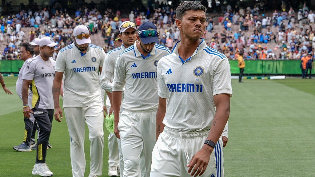 AP : Indian players walk off the field after losing the fourth Test against Australia at the Melbourne Cricket Ground.