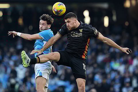 Serie A 2024-25: Napoli's Khvicha Kvaratskhelia and Venezia's Giorgio Altare in action
