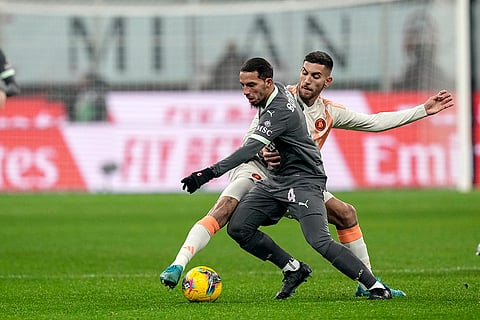 Serie A 2024-25: AC Milan's Ismael Bennacer fights for the ball with Roma's Lorenzo Pellegrini