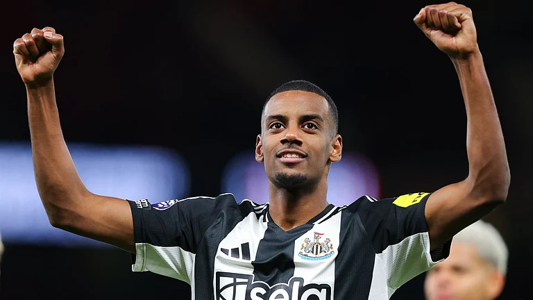 Isak celebrates at Old Trafford - null