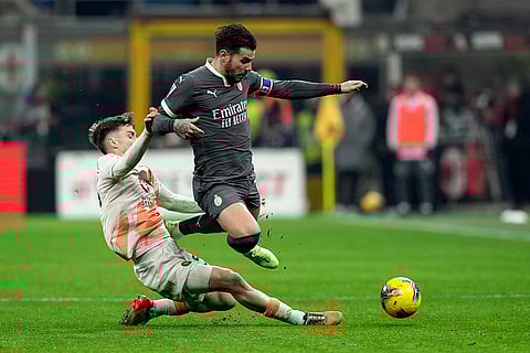 Serie A 2024-25: Roma's Alexis Saelemaekers and AC Milan's Theo Hernandez fight for the ball