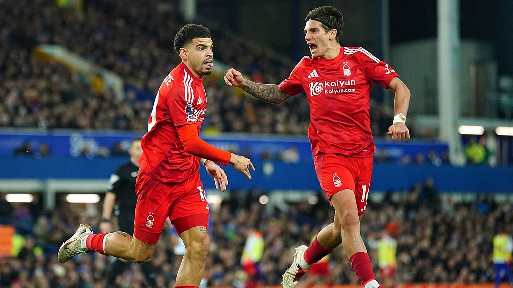AP/Peter Byrne : Morgan Gibbs-White, left, celebrates scoring their side's second goal during the English Premier League match between Everton and Nottingham Forest at Goodison Park.