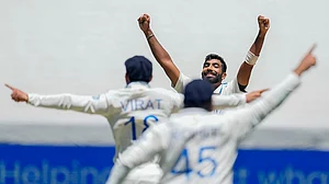 | Photo: AP/Asanka Brendon Ratnayake : India Vs Australia, 4th Test Day 4: Jasprit Bumrah celebrates after the dismissal of Australia's Travis Head