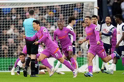 EPL 2024-25: Wolves Hwang Hee-Chan, front center, celebrates after scoring the opening goal