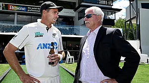 AP : New Zealand's Tim Southee, left, and Sir Richard Hadlee talk after the former's farewell Test against England in Hamilton.