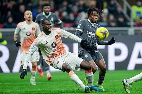 Serie A 2024-25: Roma's Evan Ndicka fights for the ball with AC Milan's Samuel Chukwueze