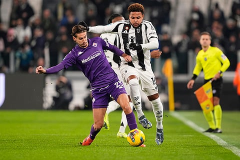 Serie A 2024-25: Fiorentina's Andrea Colpani fights for the ball with Juventus' Weston McKennie