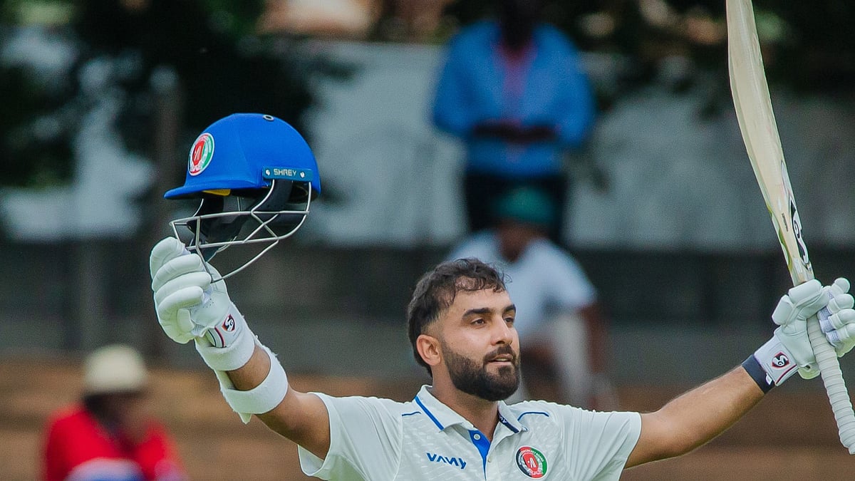 X/Afghanistan Cricket Board : Hashmatullah Shahidi celebrates his century on Day 4 of the first Test between Afghanistan and Zimbabwe in Bulawayo.