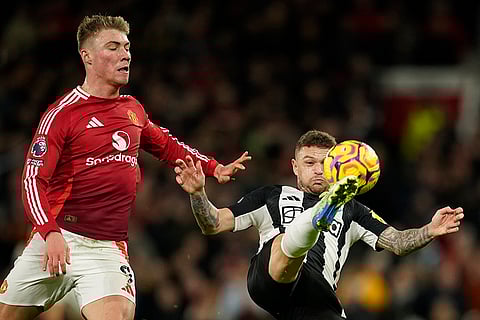 EPL 2024-25: Newcastle's Kieran Trippier duels for the ball with Man United's Rasmus Hojlund