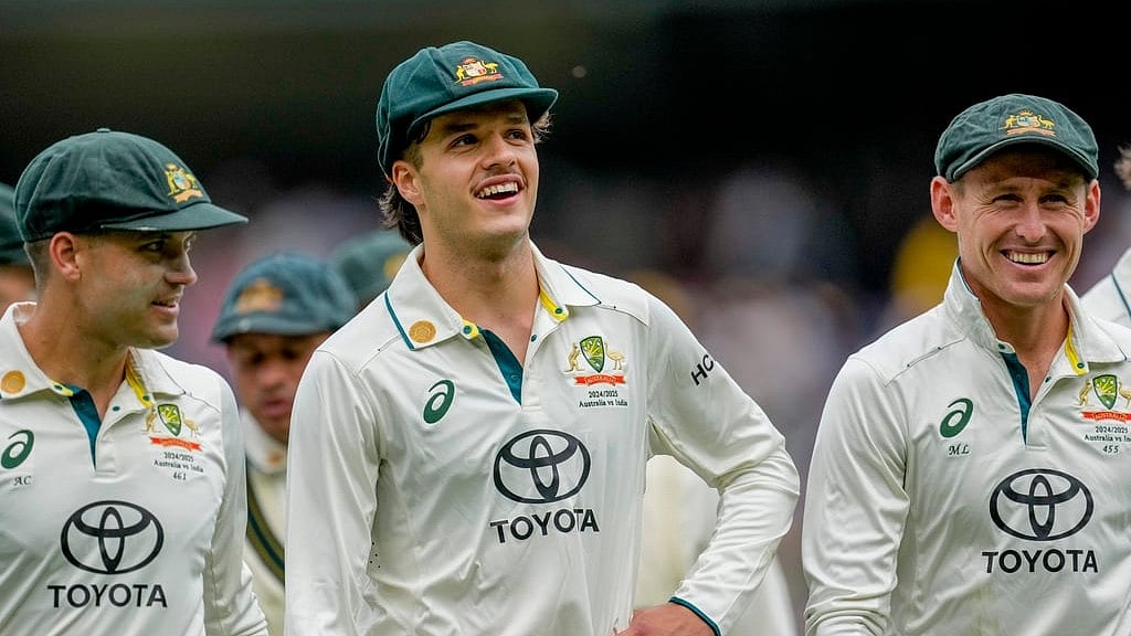 AP : Australia's Alex Carey, left, Sam Konstas, center, and Marnus Labuschagne walk off the field on the end of play of the second day of the fourth cricket test between Australia and India at the Melbourne Cricket Ground, Melbourne, Australia, Friday, Dec. 27, 2024.