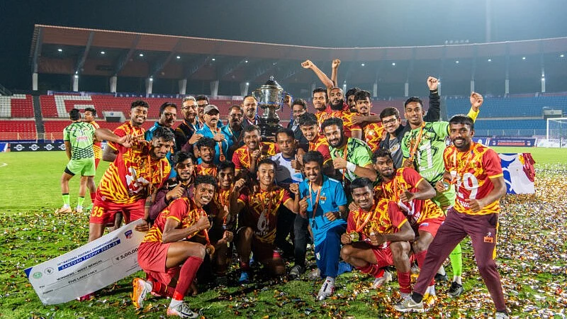West Bengal celebrate after winning the Santosh Trophy in Hyderabad.