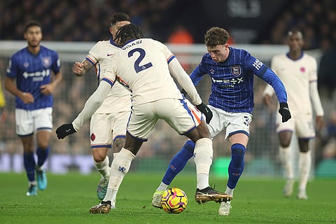 EPL 2024-25: Ipswich Town's Nathan Broadhead, right is challenged by Chelsea's Axel Disai