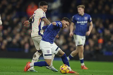 EPL 2024-25: Chelsea's Enzo Fernandez, left challenges Ipswich Town's Wes Burns