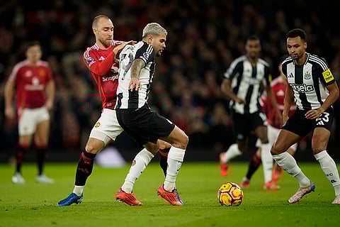 EPL 2024-25: Man United's Christian Eriksen, front left, duels for the ball with Newcastle's Bruno Guimaraes