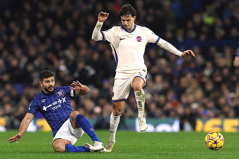 EPL 2024-25: Chelsea's Joao Felix, right, avoids a tackle by Ipswich Town's Sam Morsy