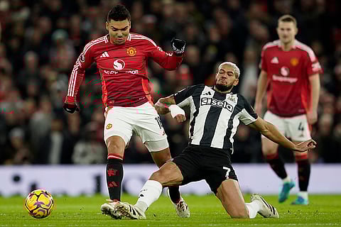 EPL 2024-25: Man United's Casemiro duels for the ball with Newcastle's Joelinton