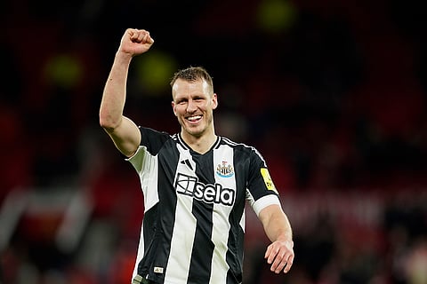 EPL 2024-25: Newcastle's Dan Burn celebrates at the end of the match