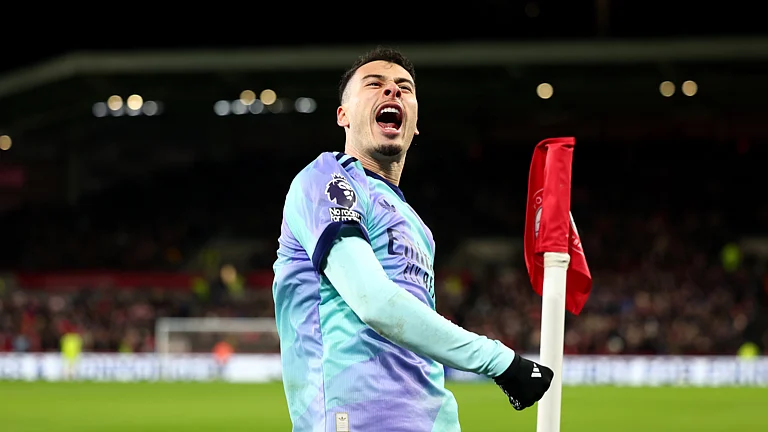 Gabriel Martinelli celebrates Arsenal's third goal in their win over Brentford - null