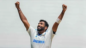 AP Photo/Asanka Brendon Ratnayake : India's Jasprit Bumrah celebrates the wicket of Australia's Travis Head during play on day four of the fourth cricket test between Australia and India at the Melbourne Cricket Ground, Melbourne.