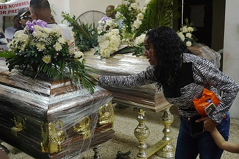 Ecuador Missing Children: Caskets four children