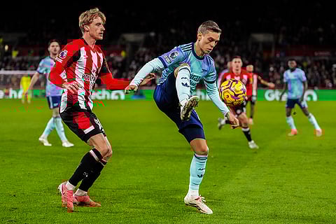 EPL 2024-25: Arsenal's Leandro Trossard duels for the ball with Brentford's Mads Roerslev