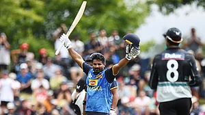 Chris Symes/Photosport via AP : Sri Lanka player Kusal Perera celebrates his century during the 3rd T20 match between New Zealand and Sri Lanka at Saxton Oval in Nelson, New Zealand, Thursday, Jan. 2, 2025