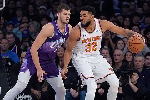 NBA 2024-25: Jazz's Walker Kessler (24) defends Knicks' Karl-Anthony Towns 