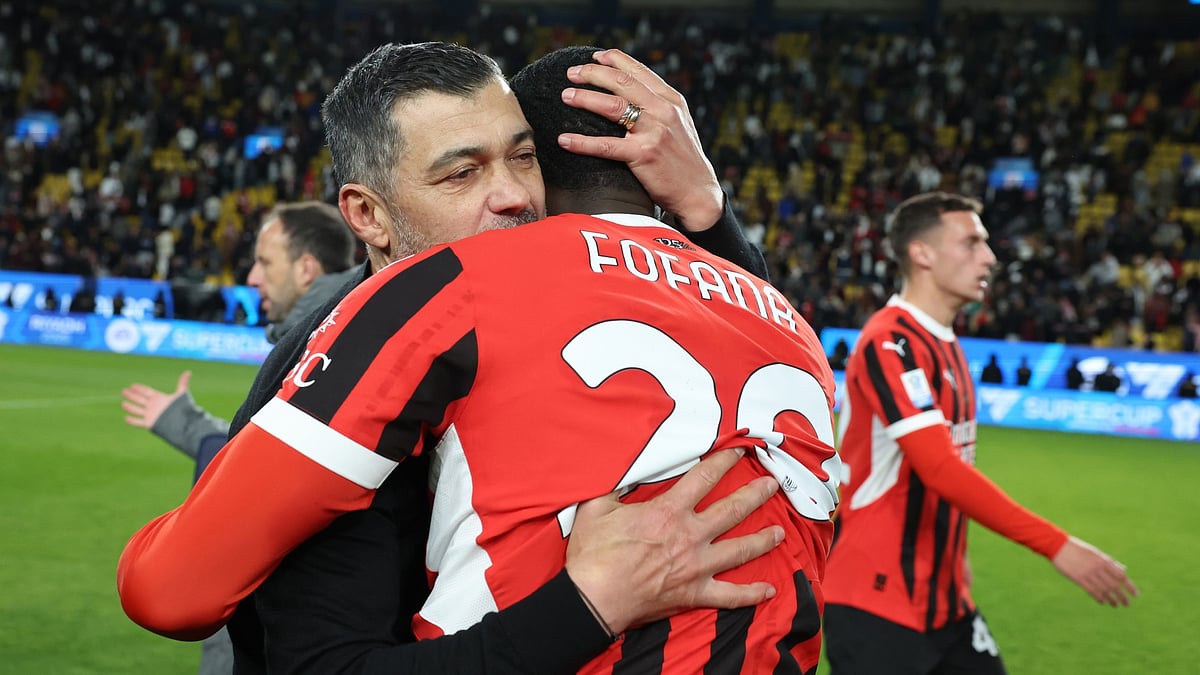 Sergio Conceicao embraces Youssouf Fofana