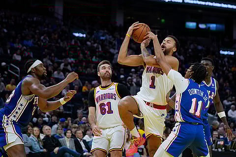 NBA 2024-25: Warriors forward Kyle Anderson (1) is fouled by 76ers guard Jeff Dowtin Jr.