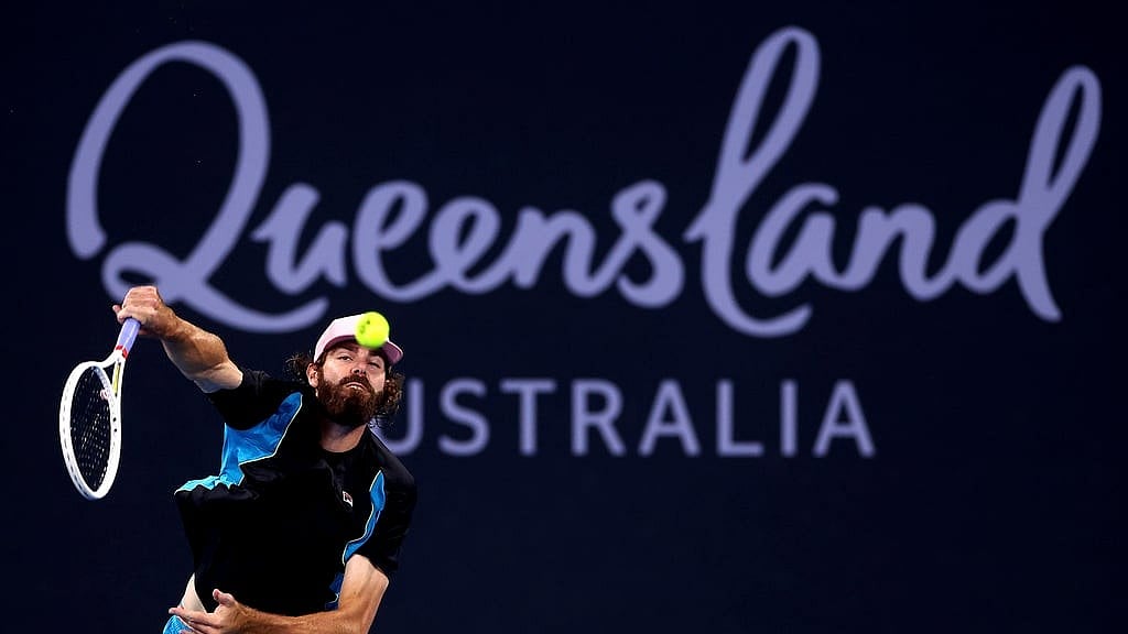 AP/Pat Hoelscher : Reilly Opelka plays serves to Serbia's Novak Djokovic during their match at the Brisbane International.