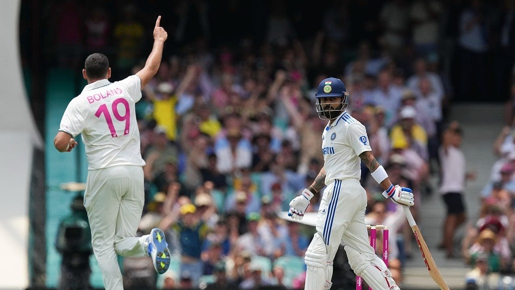 AP Photo/Mark Baker : India's Virat Kohli, right, reacts after he was dismissed by Australia's Scott Boland during play on the first day of the fifth cricket test between India and Australia at the Sydney Cricket Ground, in Sydney, Australia, Friday, Jan. 3, 2025.