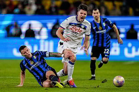 Italian Super Cup 2024-25: Atalanta's Berat Djimsiti is tackled by Inter Milan's Lautaro Martinez
