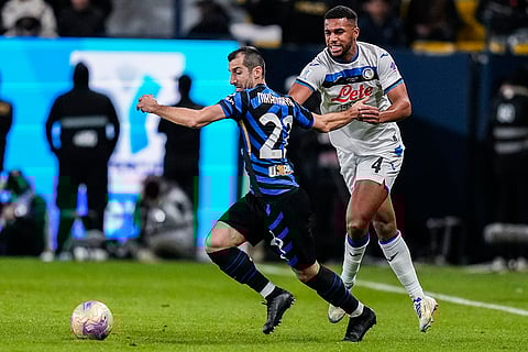 Italian Super Cup 2024-25: Inter Milan's Henrikh Mkhitaryan, left, duels for the ball with Atalanta's Isak Hien