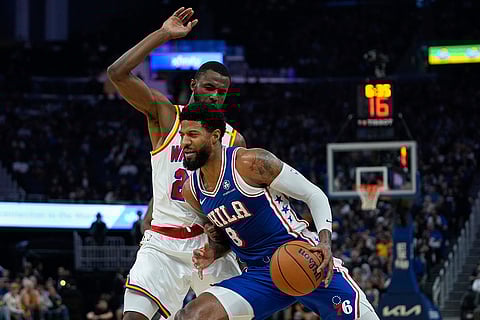 NBA 2024-25: 76ers forward Paul George moves the ball
