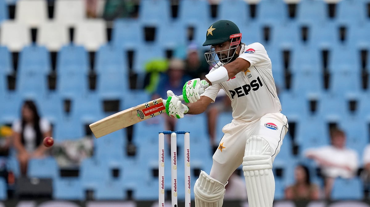 AP Photo/Themba Hadebe : Pakistan's Babar Azam plays a side shot during day two of the Test cricket match between South Africa and Pakistan, at the Centurion Park in Centurion.