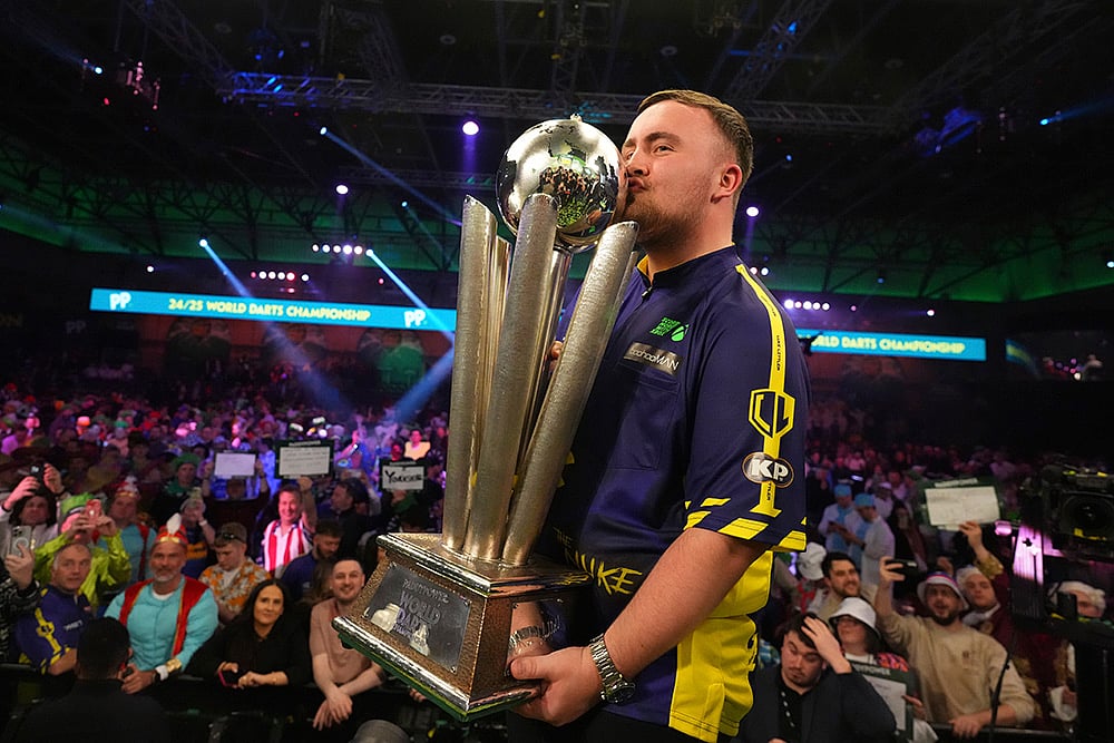Photo: AP/Kirsty Wigglesworth : Luke Littler World Darts Championship 2025