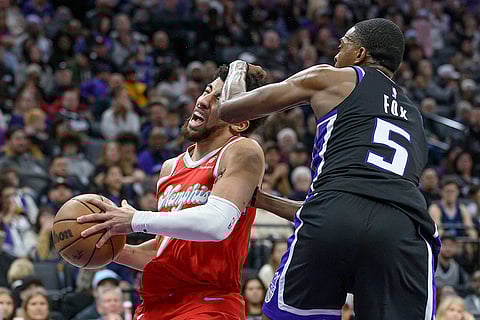 NBA 2024-25: Grizzlies guard Scotty Pippen Jr. (1) is fouled by Kings guard De'Aaron Fox
