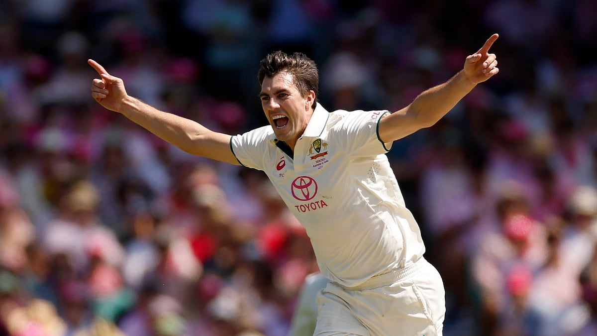 Pat Cummins celebrates a wicket against India