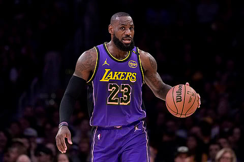 NBA 2024-25: Los Angeles Lakers forward LeBron James dribbles