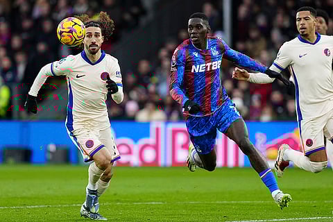 EPL 2024-25: Chelsea's Marc Cucurella, left, and Crystal Palace's Ismaila Sarr run for the ball